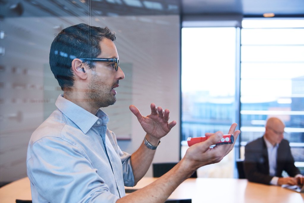 Investment banker presenting to clients